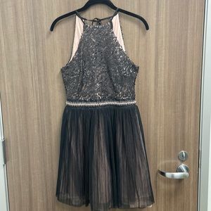 Trixxi black dress with sequin top and multilayer bottom